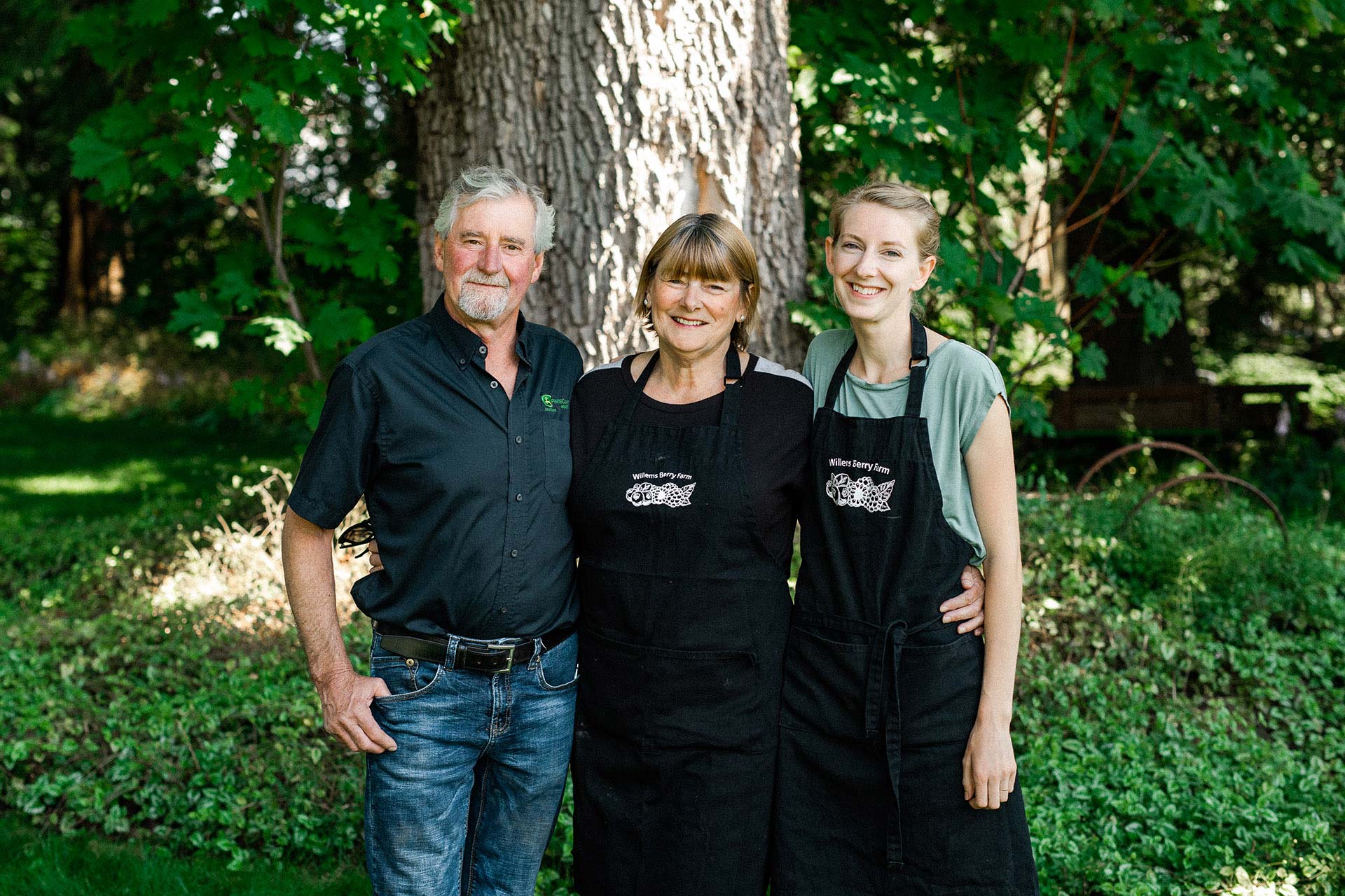Smiling strawberry growers from Willems Berry Farm in Abbotsford, British Columbia