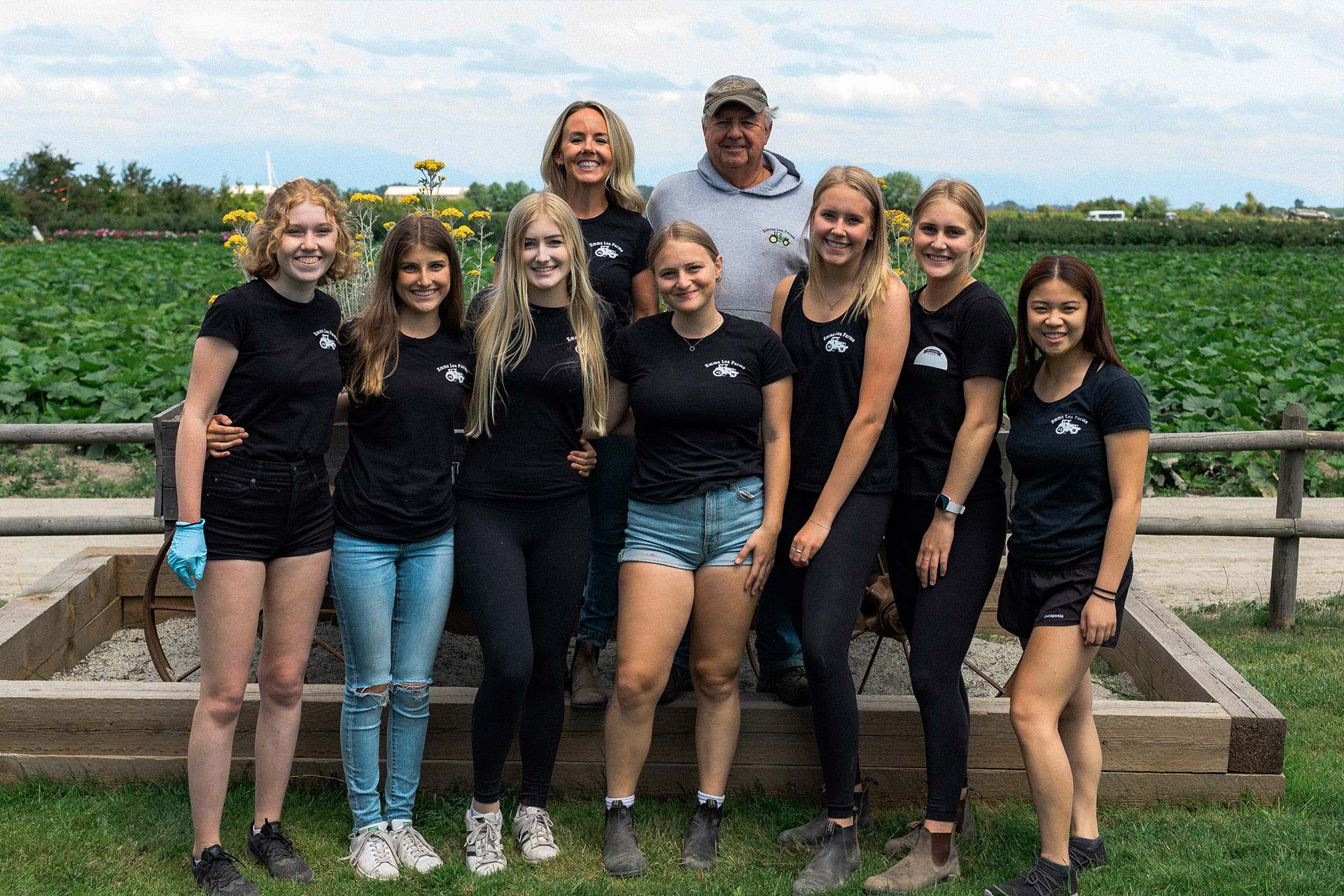 Group of smiling strawberry growers from Willems Berry Farm in Abbotsford, British Columbia
